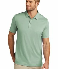 Travis Mathews TravisMathew Coto Performance Polo -Golf Clubs Sales 2023 11124 BerylGrnHt 1 TM1MU410BerylGrnHtModelFront 1200W 62051.1673456731